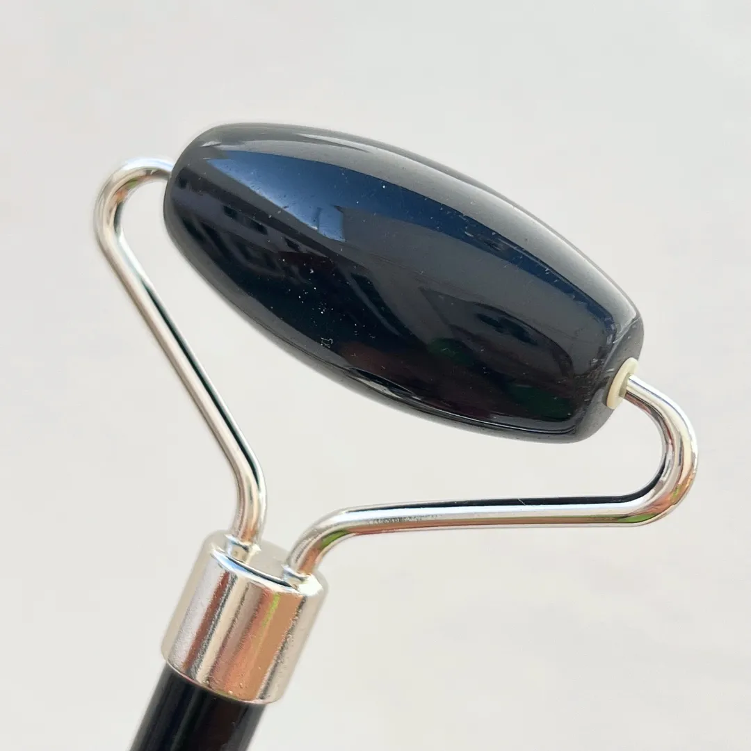 Roller facial de obsidiana natural preta polida para massagem facial